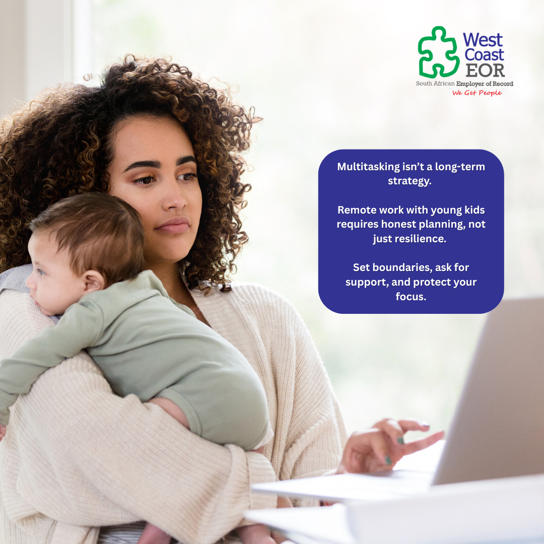 Mother working remotely with baby on her lap